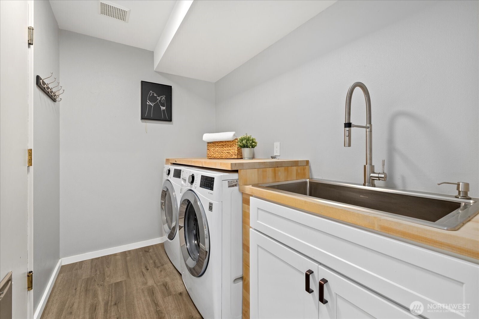 10906 Northeast 197th Street Bothell, WA 98011 - Photo 34 of 38 a utility room with dryer and washer