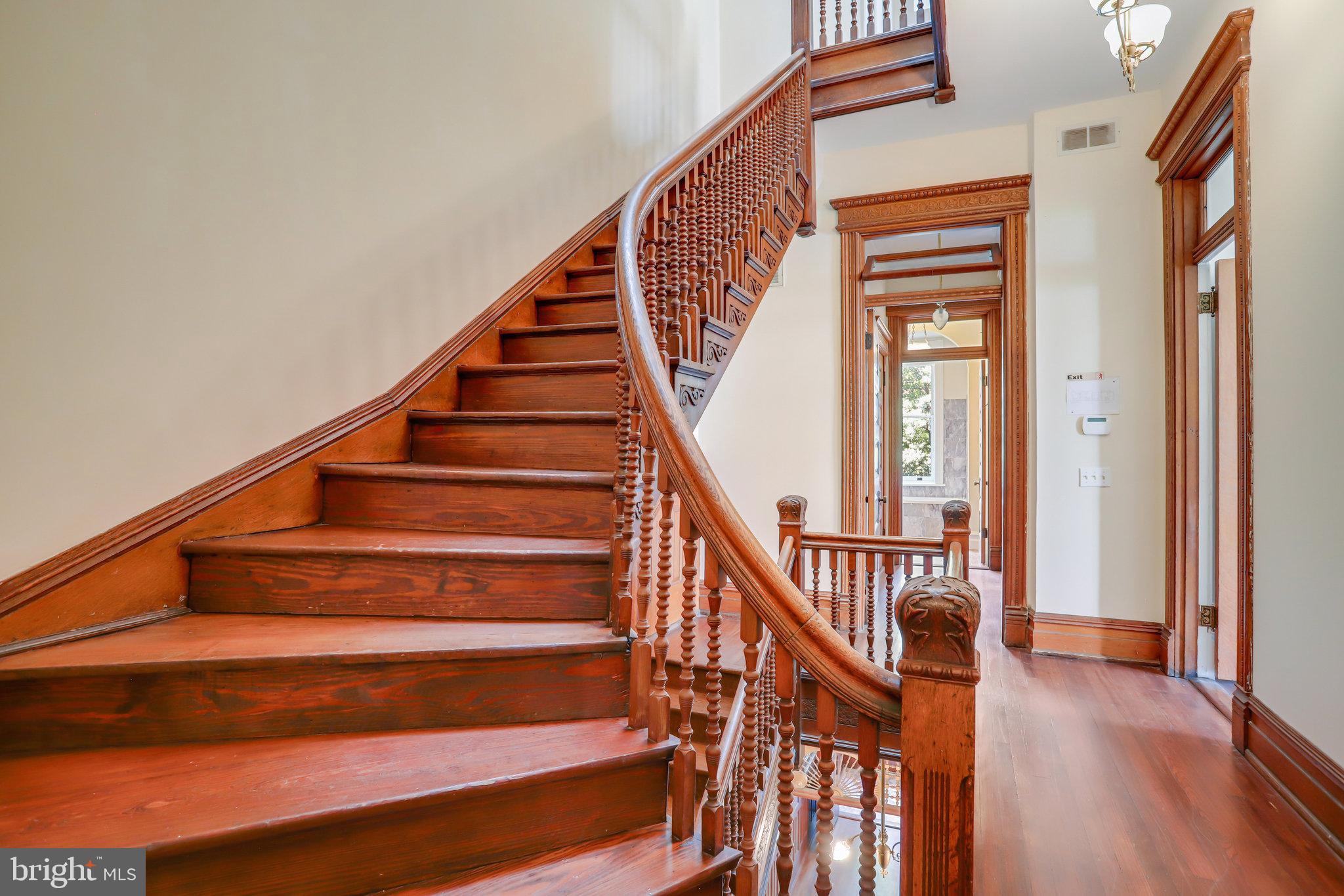 1633 16th Street Northwest Washington, DC 20009 - Photo 38 of 130 a view of entryway with wooden floor and stairs