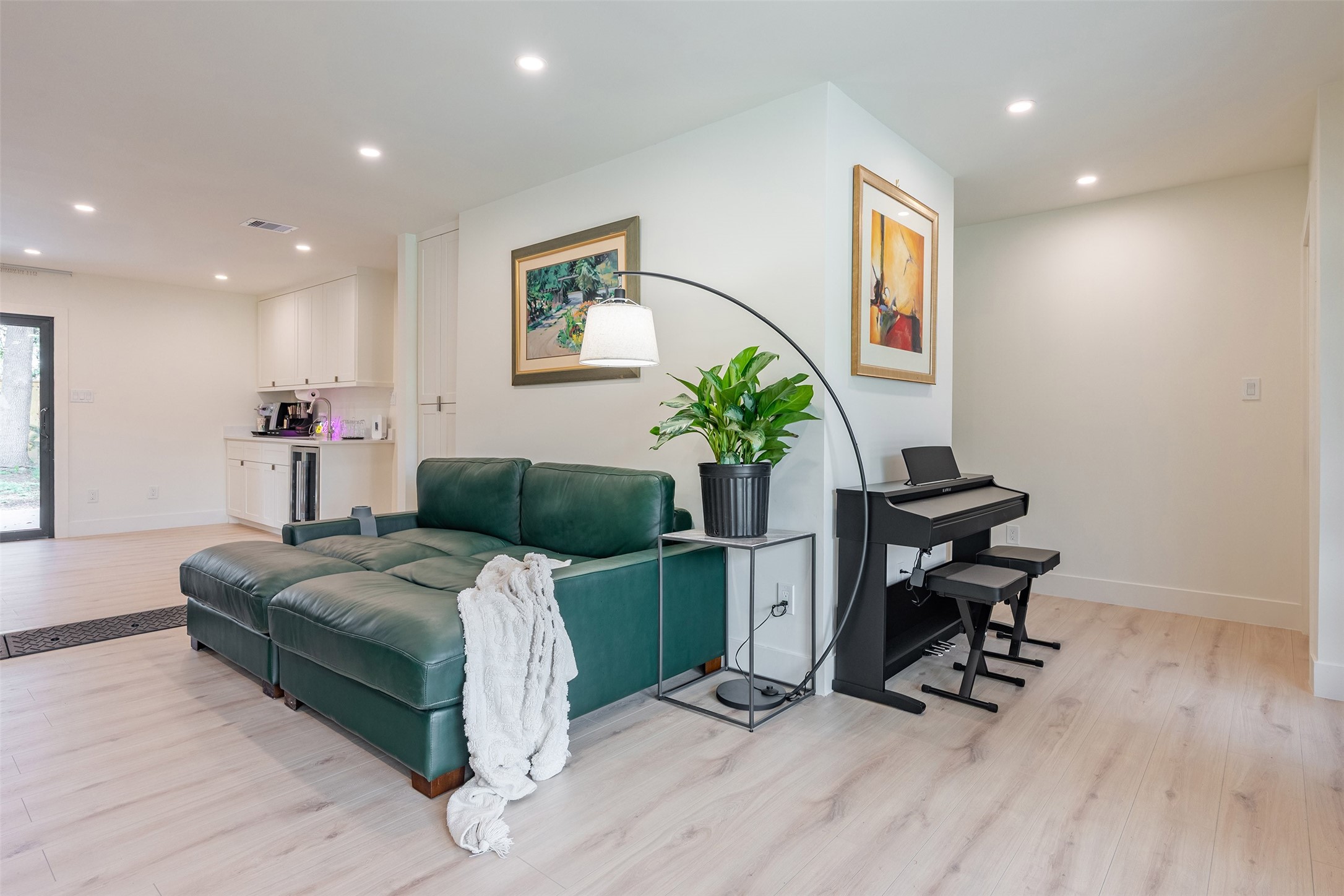 a living room with furniture and a table