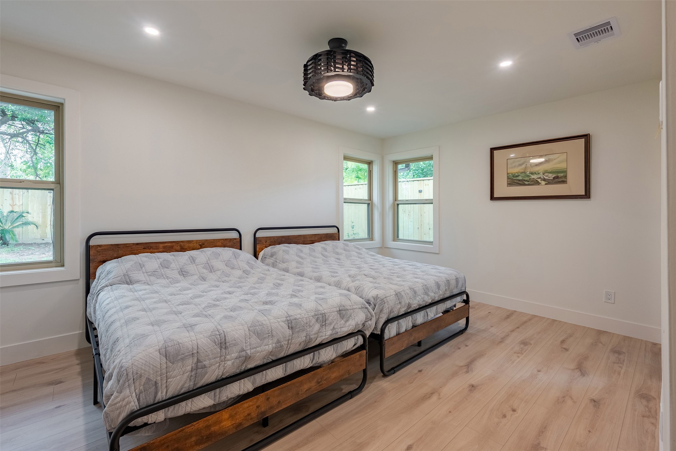 5326 Carew Street Houston, TX 77096 - Photo 17 of 30 a bedroom with a bed and window