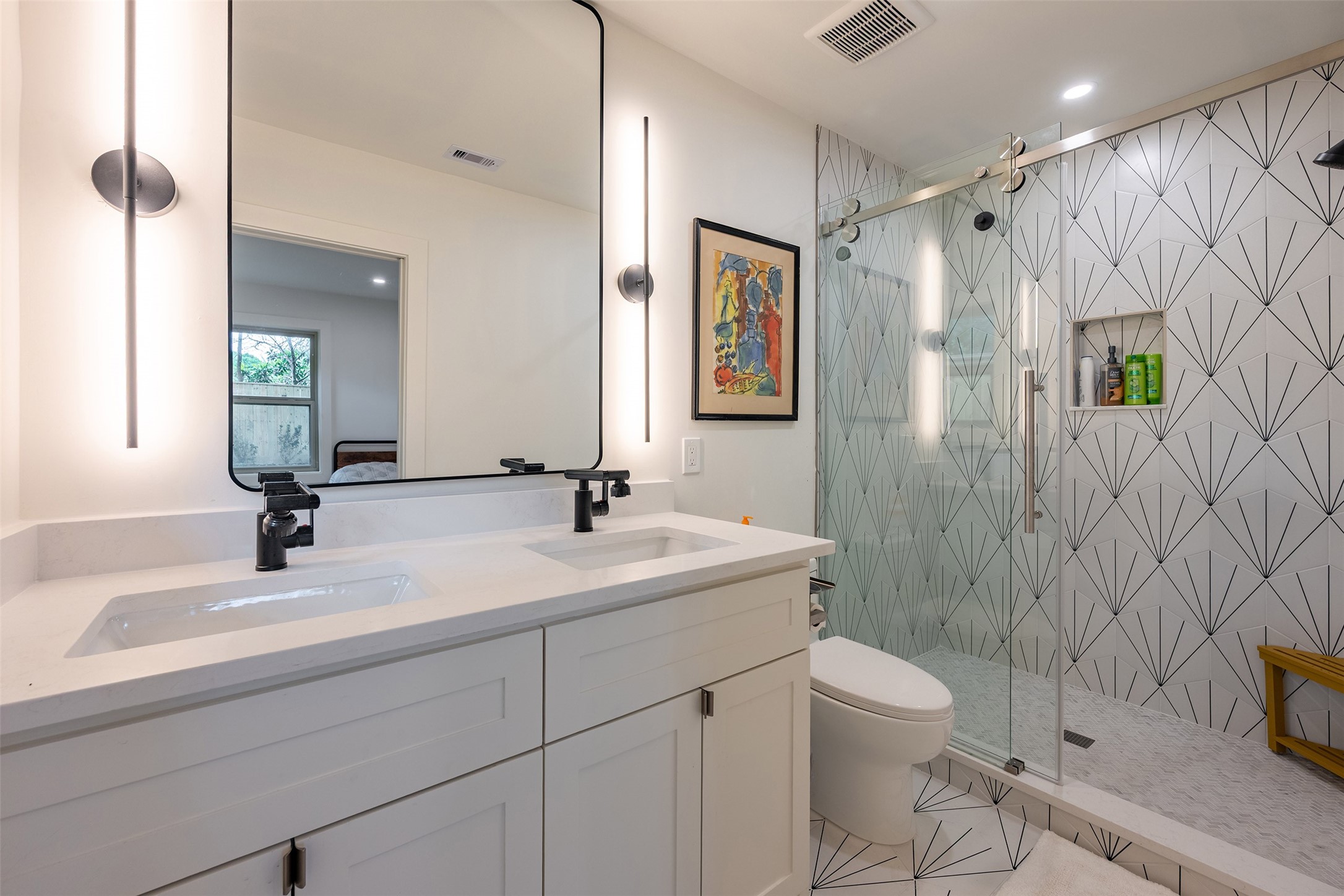 5326 Carew Street Houston, TX 77096 - Photo 19 of 30 a bathroom with a sink a toilet and shower
