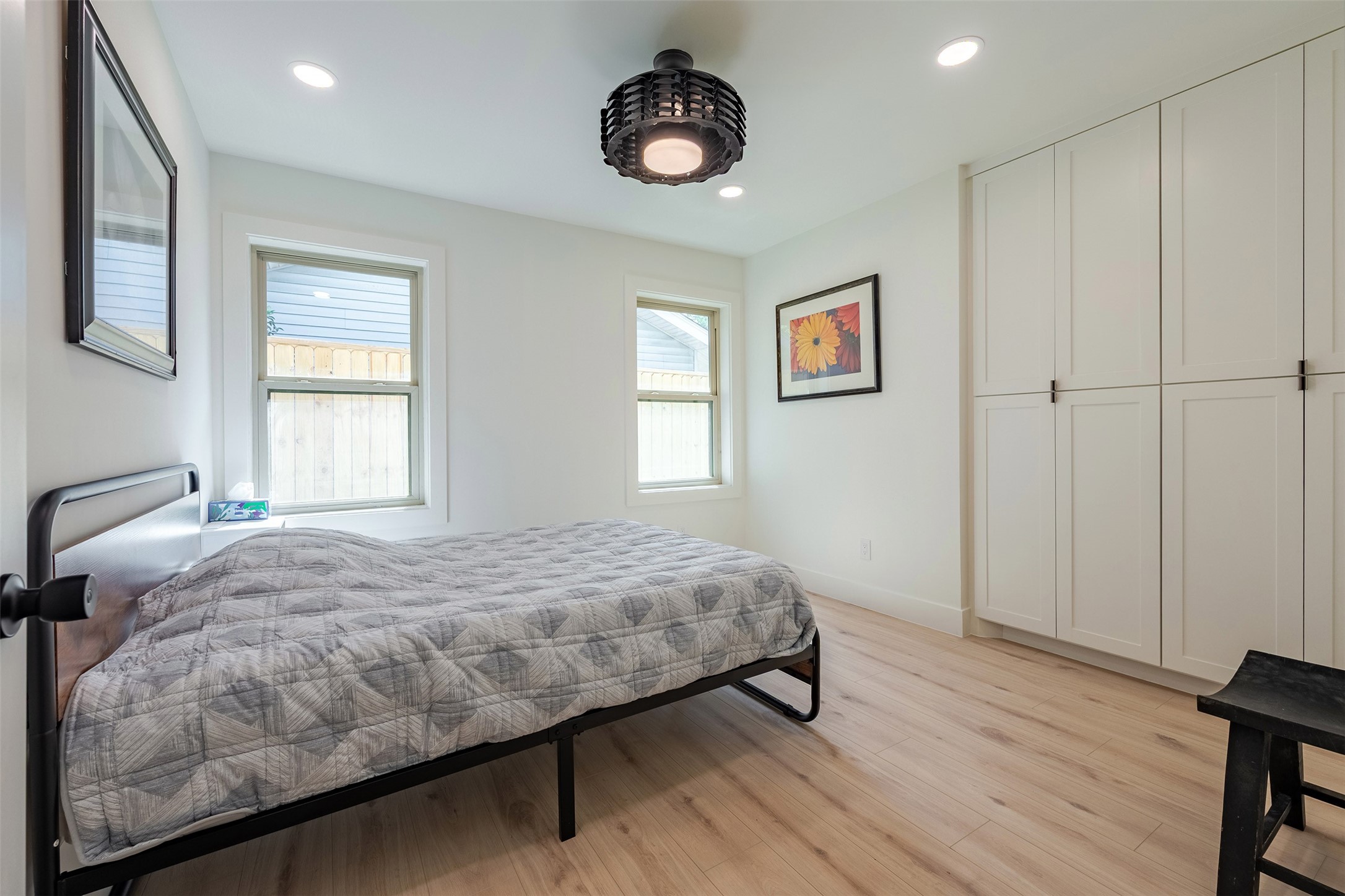 5326 Carew Street Houston, TX 77096 - Photo 21 of 30 a bedroom with a bed and a window