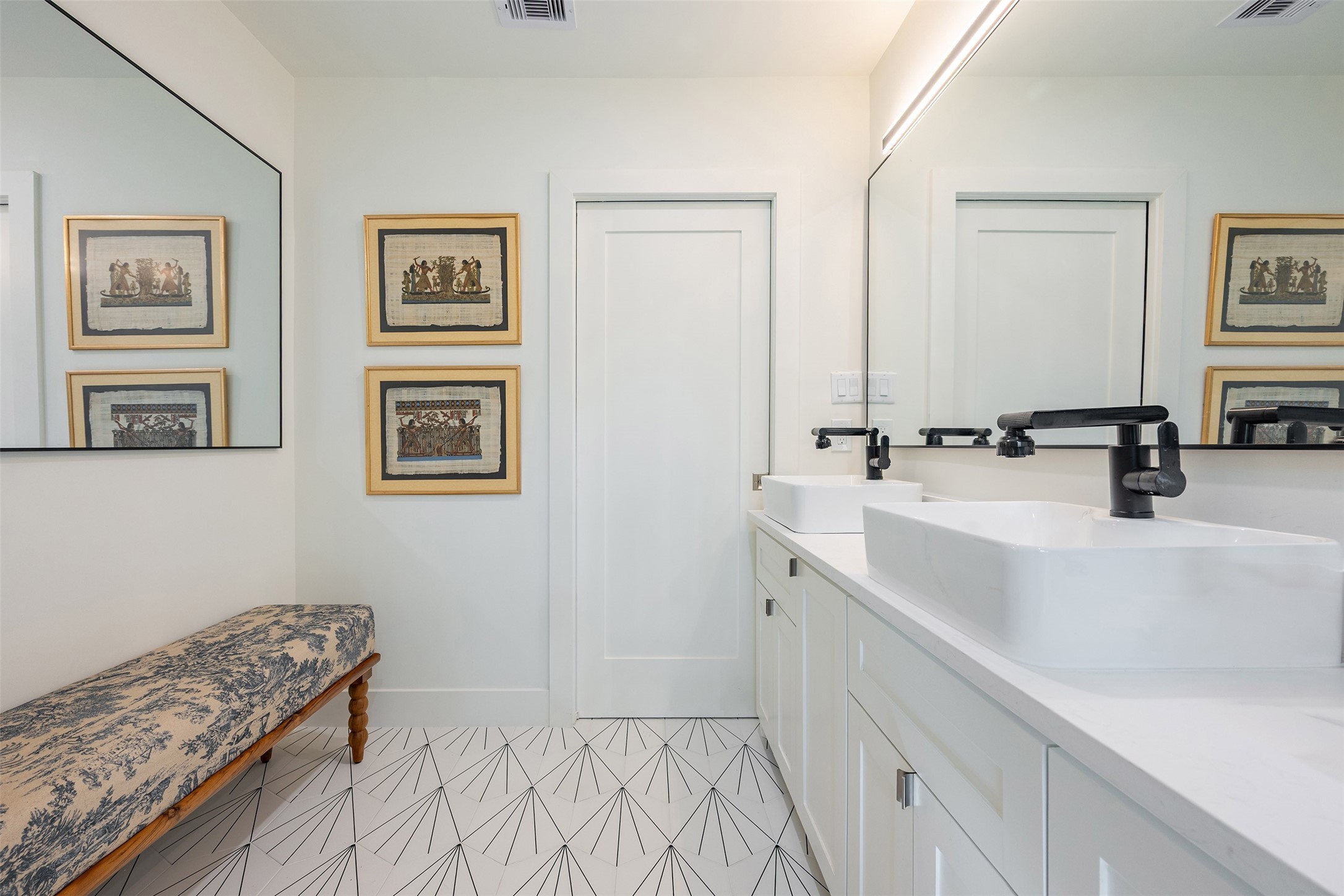 5326 Carew Street Houston, TX 77096 - Photo 23 of 30 a bathroom with a sink and a mirror