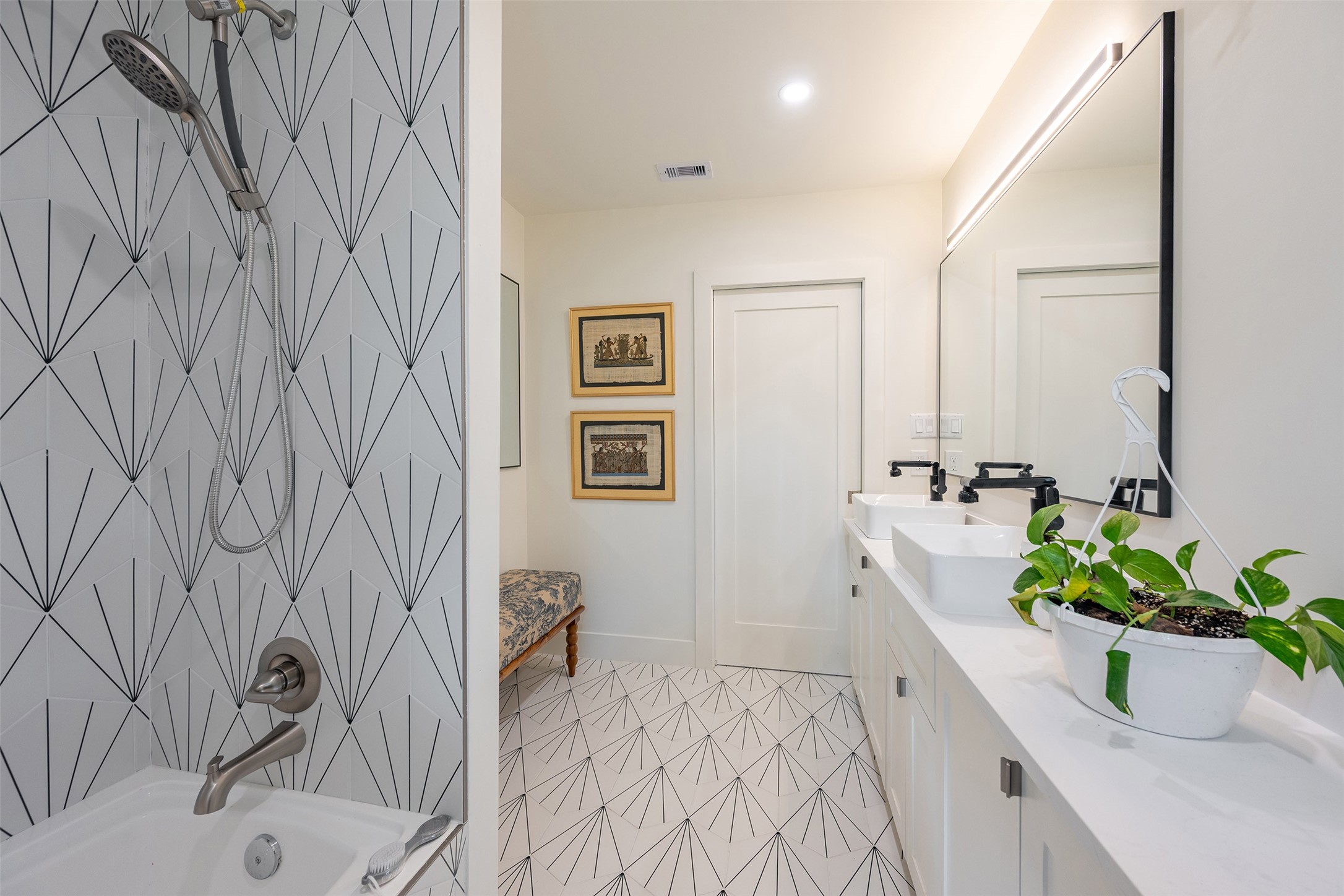 5326 Carew Street Houston, TX 77096 - Photo 24 of 30 a bathroom with a sink and a bathtub