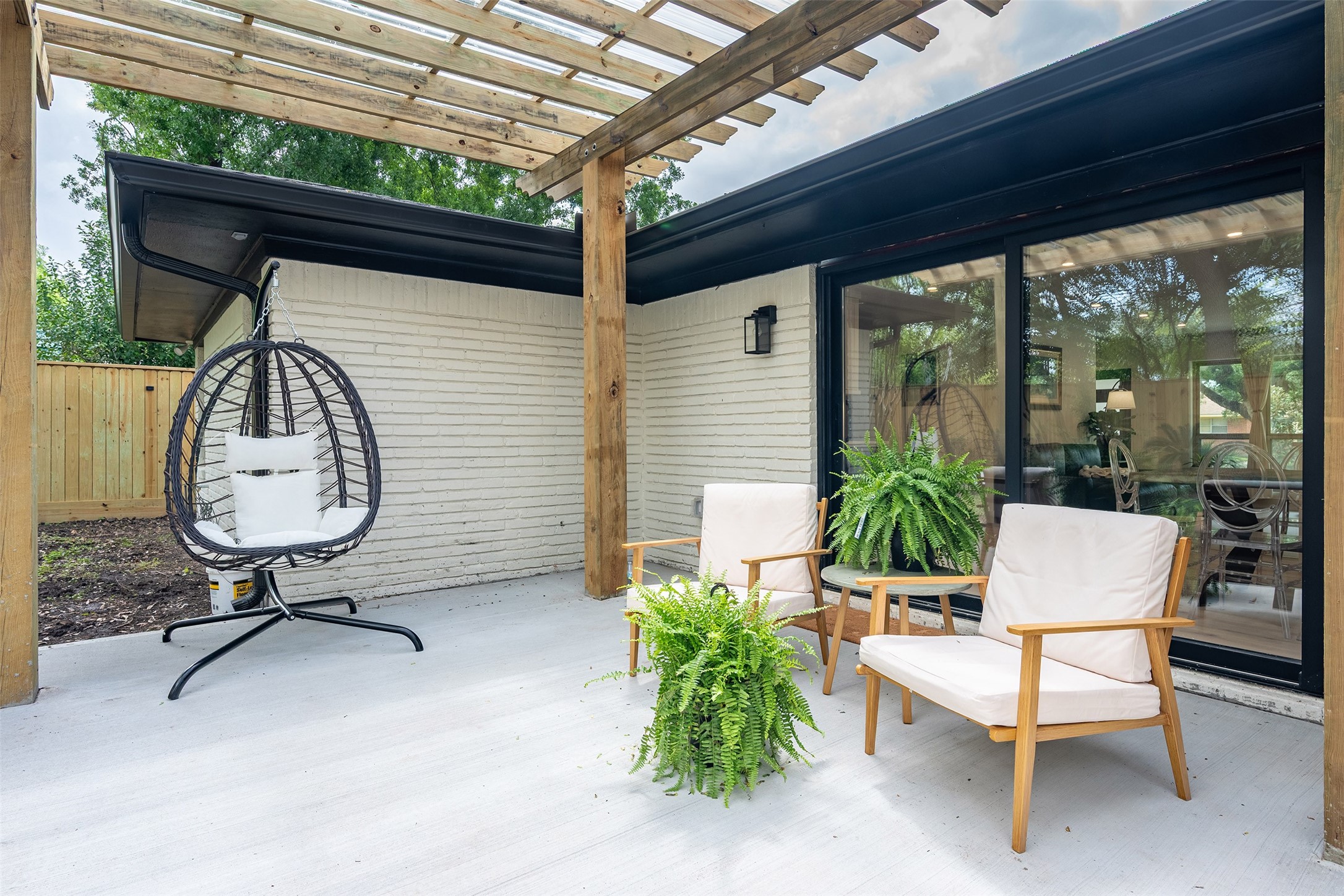 5326 Carew Street Houston, TX 77096 - Photo 26 of 30 a view of a chairs and table in patio