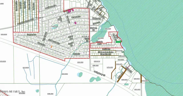 a picture of a bench in front of a building