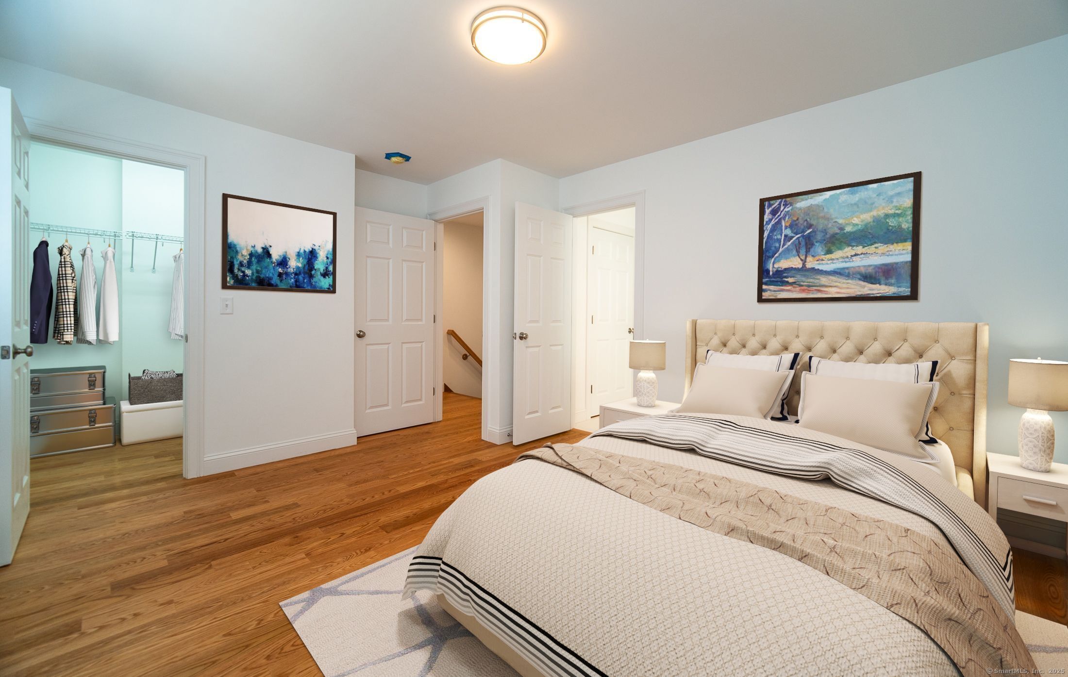 10 Fort Hill Road, Unit 3B Groton, CT 06340 - Photo 12 of 24 a bedroom with a bed and a painting on the wall