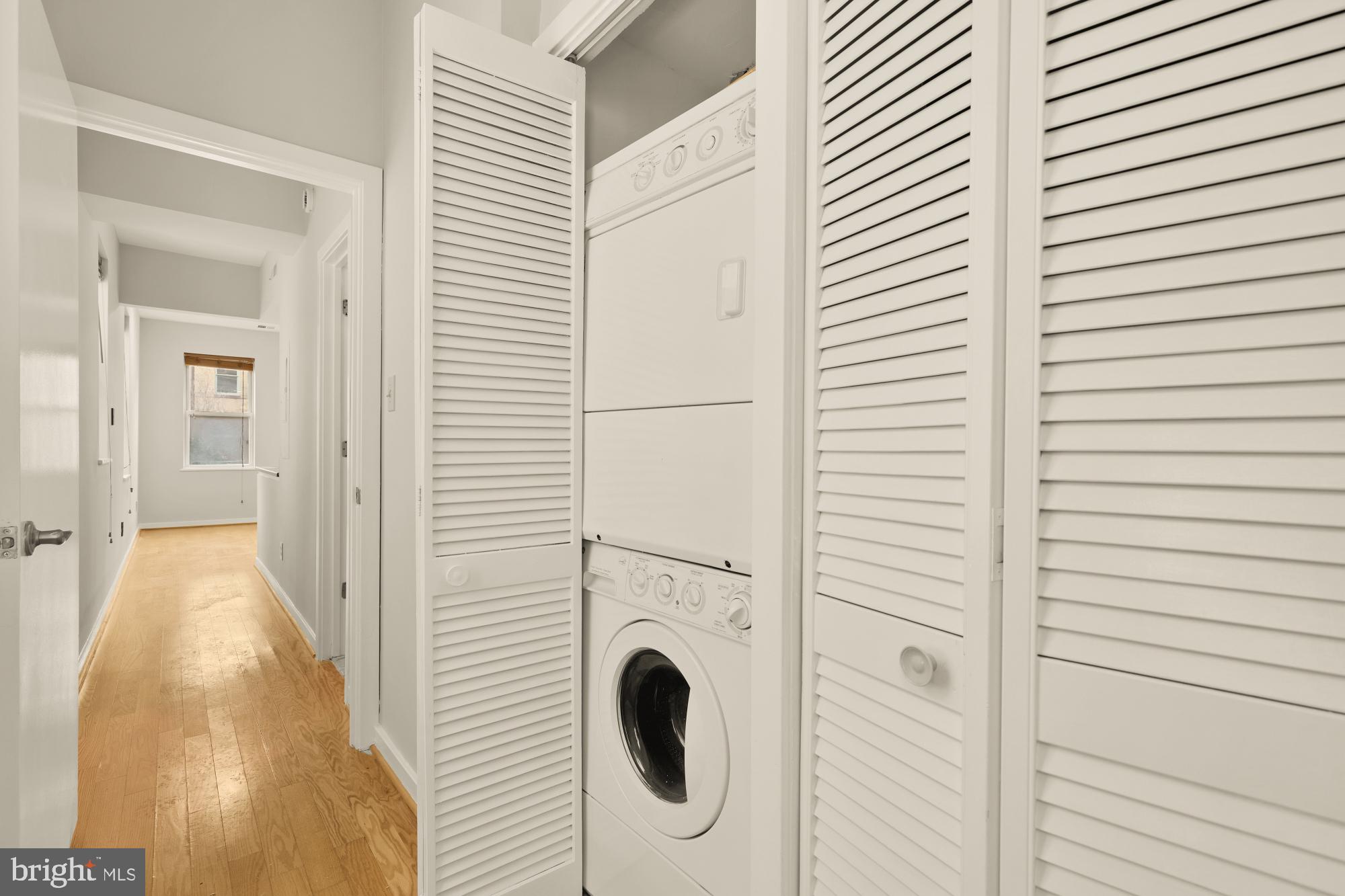 2114 N Street Northwest, Unit 11 Washington, DC 20037 - Photo 22 of 23 a view of a bathroom with a door and a window
