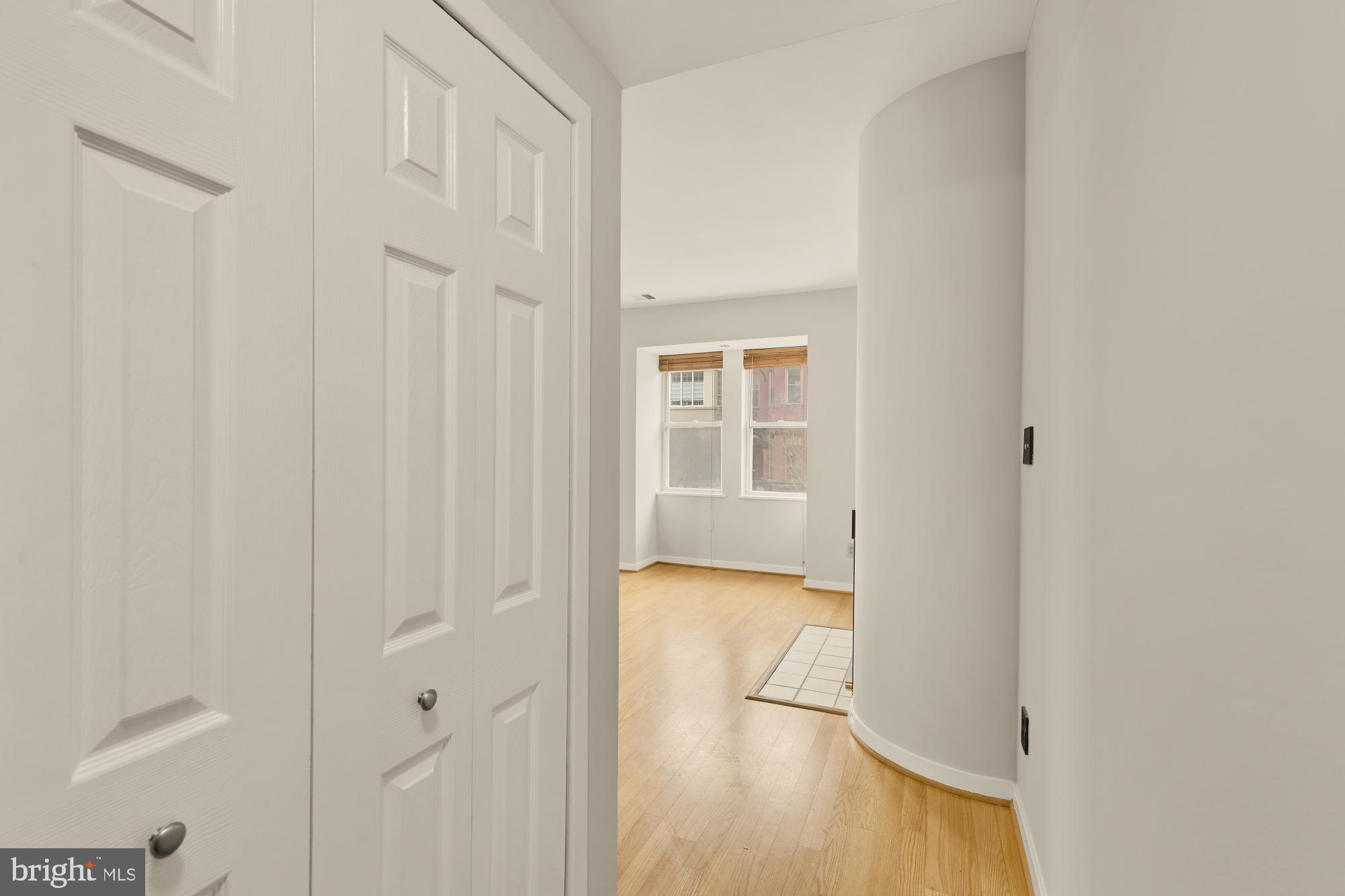 2114 N Street Northwest, Unit 11 Washington, DC 20037 - Photo 3 of 23 a view of a bedroom with wooden floor