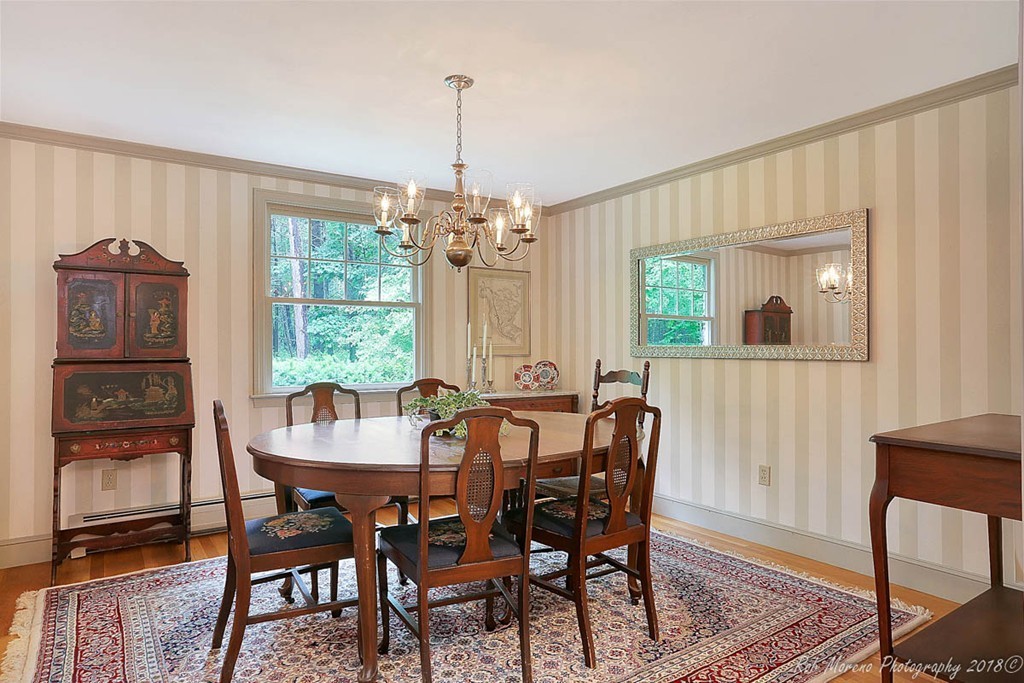 17 Janes Road Boxford, MA 01921 - Photo 11 of 29 a view of a dining room with furniture window and outside view