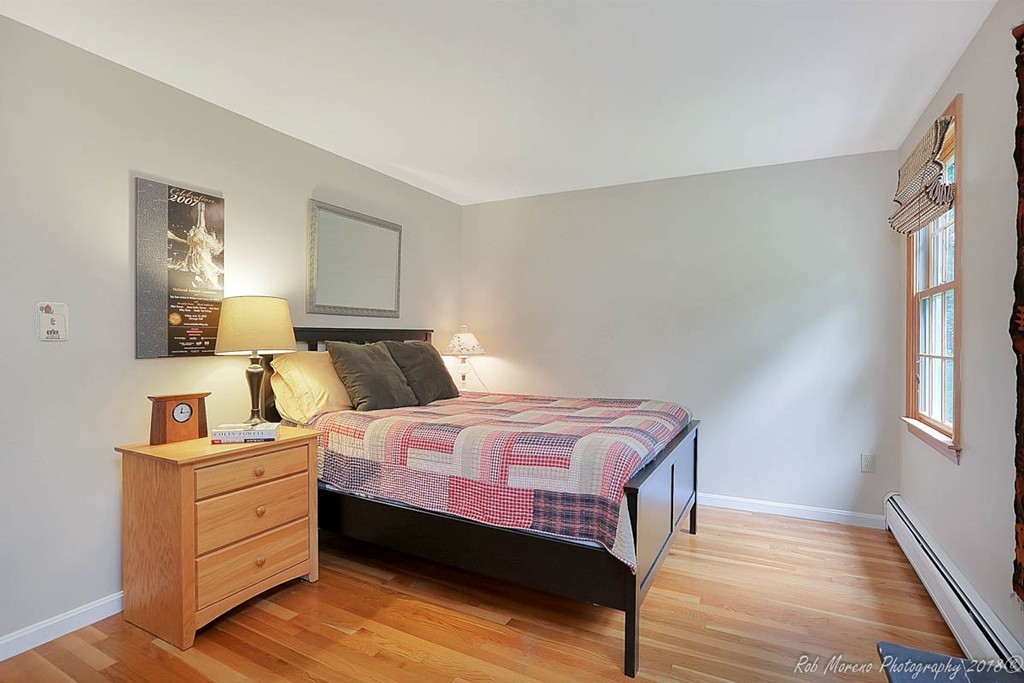 17 Janes Road Boxford, MA 01921 - Photo 19 of 29 a bedroom with a bed and a night stand