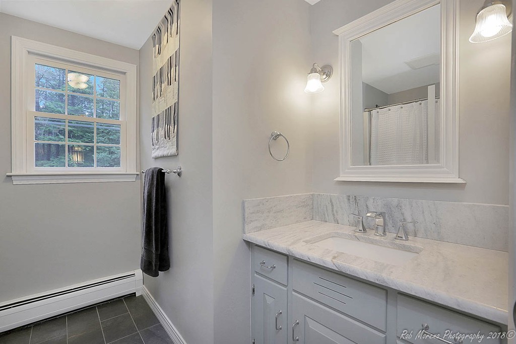 17 Janes Road Boxford, MA 01921 - Photo 20 of 29 a bathroom with a sink and a mirror
