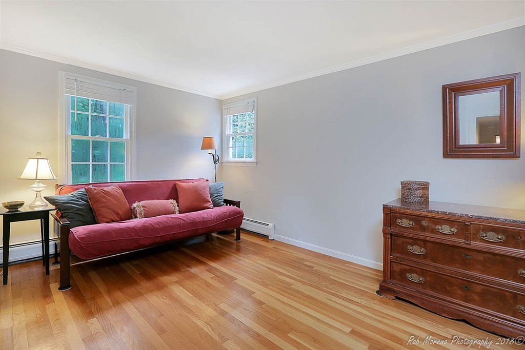 17 Janes Road Boxford, MA 01921 - Photo 21 of 29 a living room with furniture and a dresser