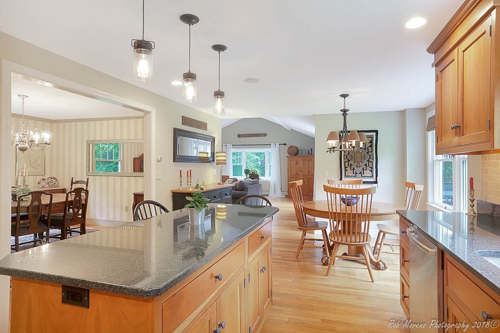 17 Janes Road Boxford, MA 01921 - Photo 5 of 29 a kitchen with stainless steel appliances granite countertop a sink a stove and a refrigerator