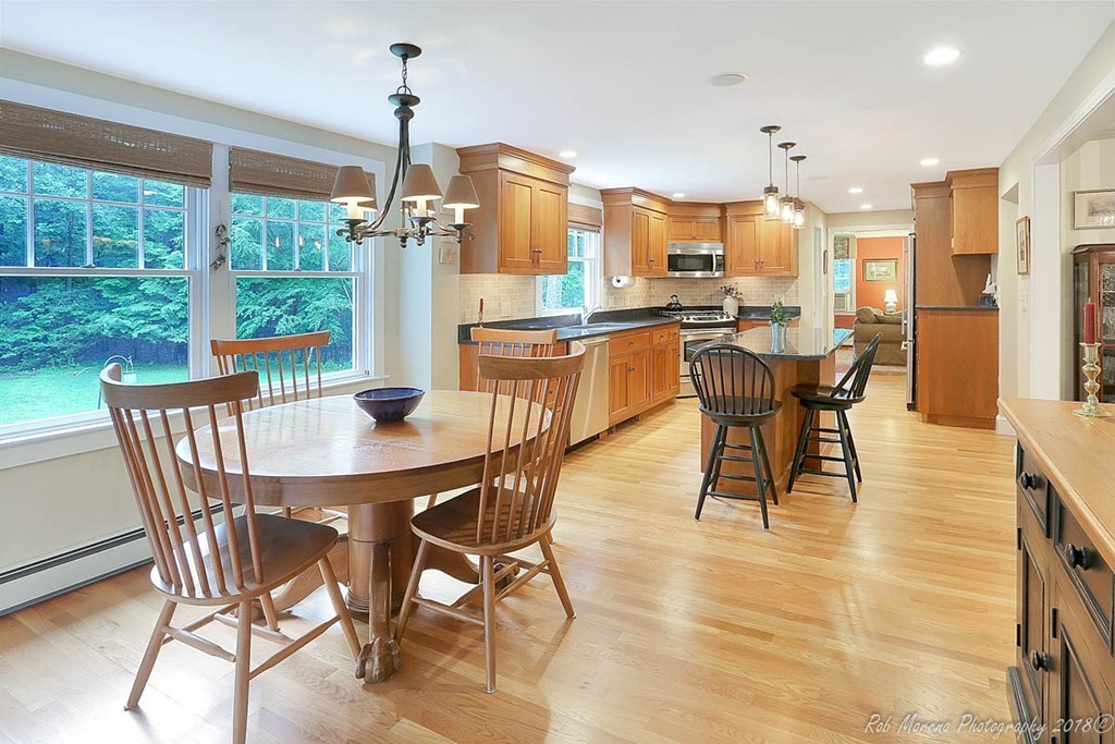 17 Janes Road Boxford, MA 01921 - Photo 6 of 29 a dining room with furniture a chandelier and wooden floor