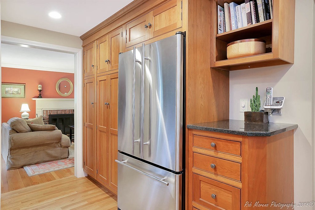 17 Janes Road Boxford, MA 01921 - Photo 7 of 29 a kitchen with stainless steel appliances granite countertop a refrigerator and a couch