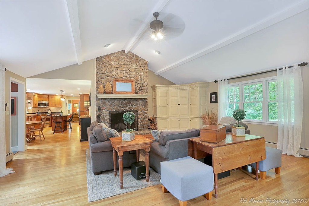17 Janes Road Boxford, MA 01921 - Photo 9 of 29 a living room with furniture and a fireplace