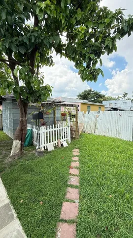 a view of a deck with a yard