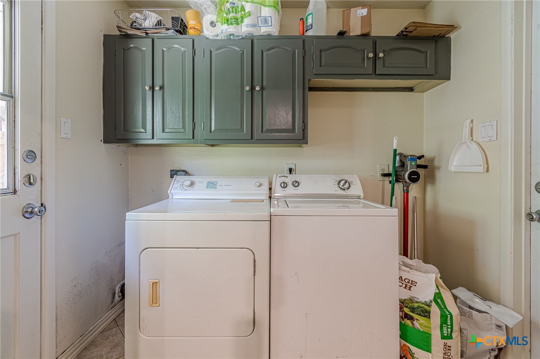 133 Algarita Road San Marcos, TX 78666 - Photo 27 of 43 a utility room with dryer and washer
