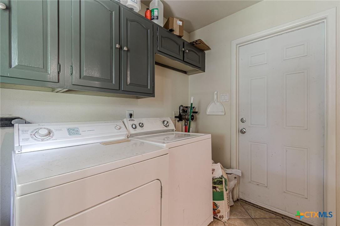133 Algarita Road San Marcos, TX 78666 - Photo 28 of 43 a utility room with dryer and washer