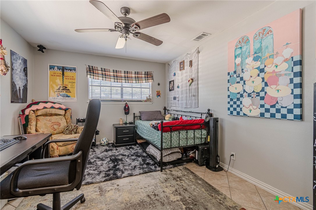133 Algarita Road San Marcos, TX 78666 - Photo 3 of 43 a living room with furniture and a window