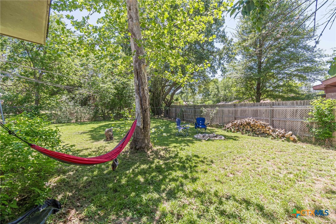 133 Algarita Road San Marcos, TX 78666 - Photo 39 of 43 a view of a backyard with swimming pool
