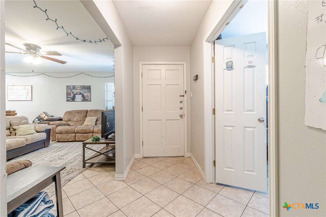 133 Algarita Road San Marcos, TX 78666 - Photo 6 of 43 a view of a livingroom with furniture and a window