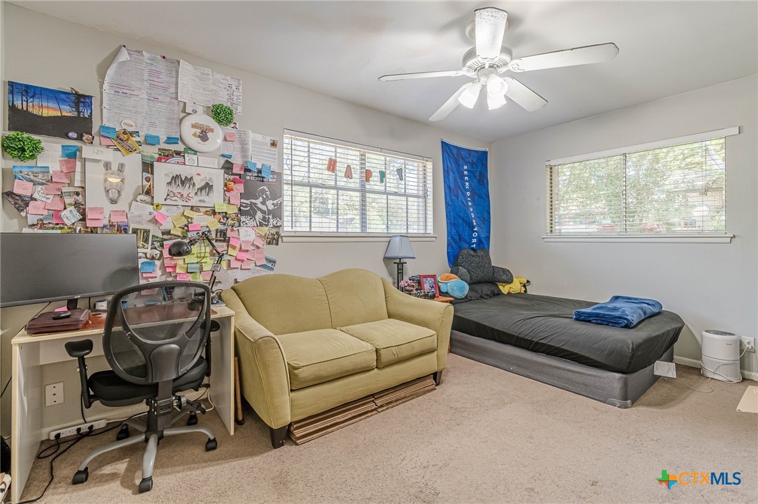 133 Algarita Road San Marcos, TX 78666 - Photo 7 of 43 a living room with furniture and a window