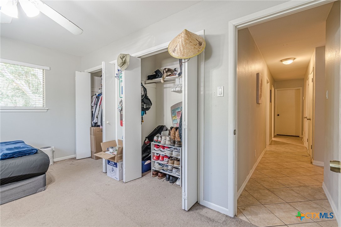 133 Algarita Road San Marcos, TX 78666 - Photo 8 of 43 a view of a livingroom with storage and utility room