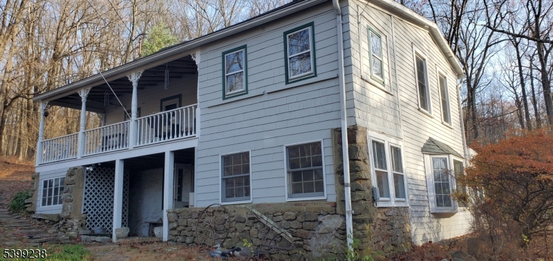 148 Mt Grove Road Califon, NJ 07830 - Photo 12 of 17 a view of a house with a large windows