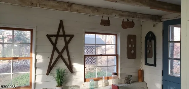 a front door view of a house with a porch