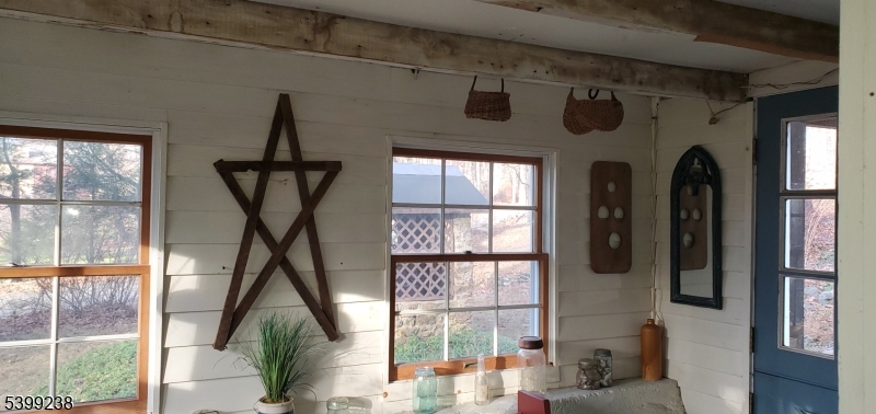 148 Mt Grove Road Califon, NJ 07830 - Photo 4 of 17 a front door view of a house with a porch