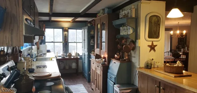 a very nice looking room with a large window and couch