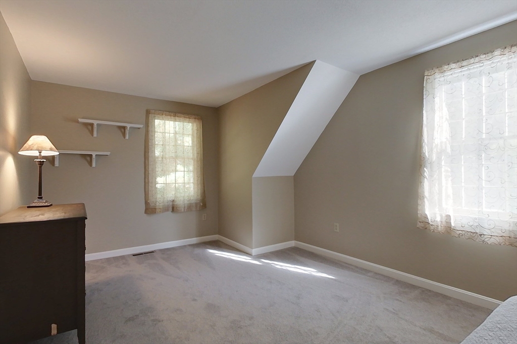 8 Tucker Park, Unit D Pepperell, MA 01463 - Photo 22 of 35 a view of empty room with window