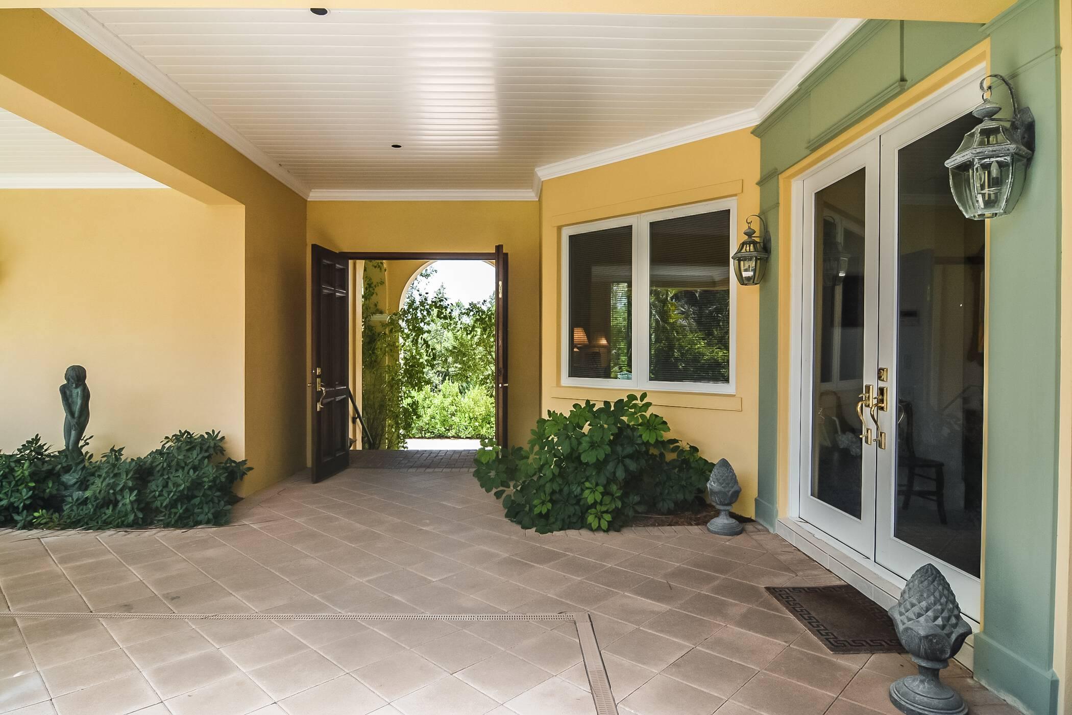 148 North Beach Road Hobe Sound, FL 33455 - Photo 9 of 40 Front Door
