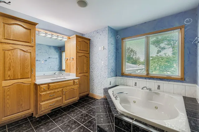 a bathroom with a sink and a bathtub