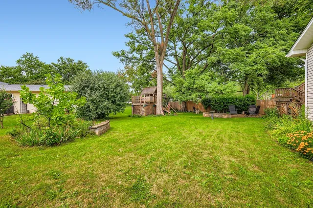 a view of a backyard with a garden