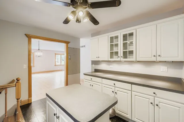 a kitchen with a stove a sink and a refrigerator