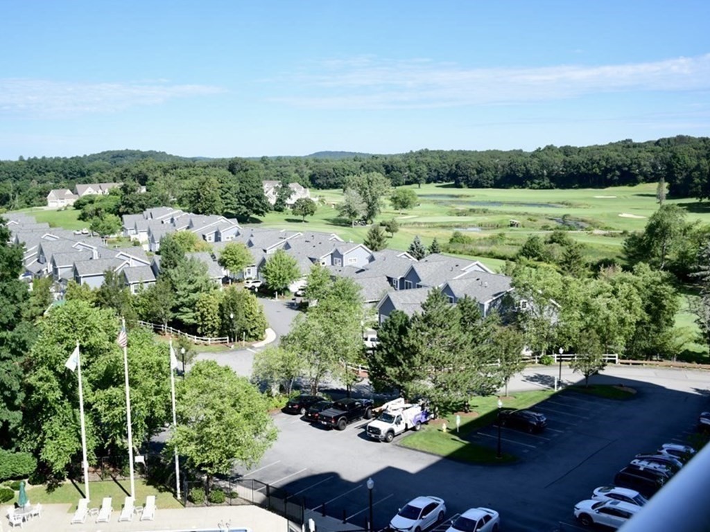 36 Village Road, Unit 713 Middleton, MA 01949 - Photo 32 of 39 a view of a garden with an outdoor space