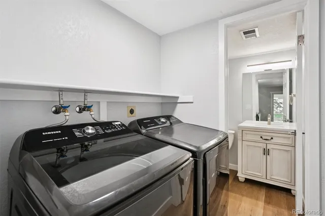 a utility room with dryer and washer