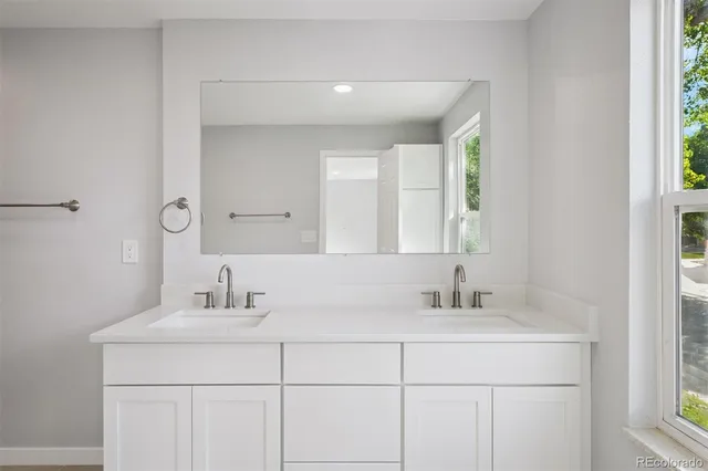 a bathroom with a shower and a toilet