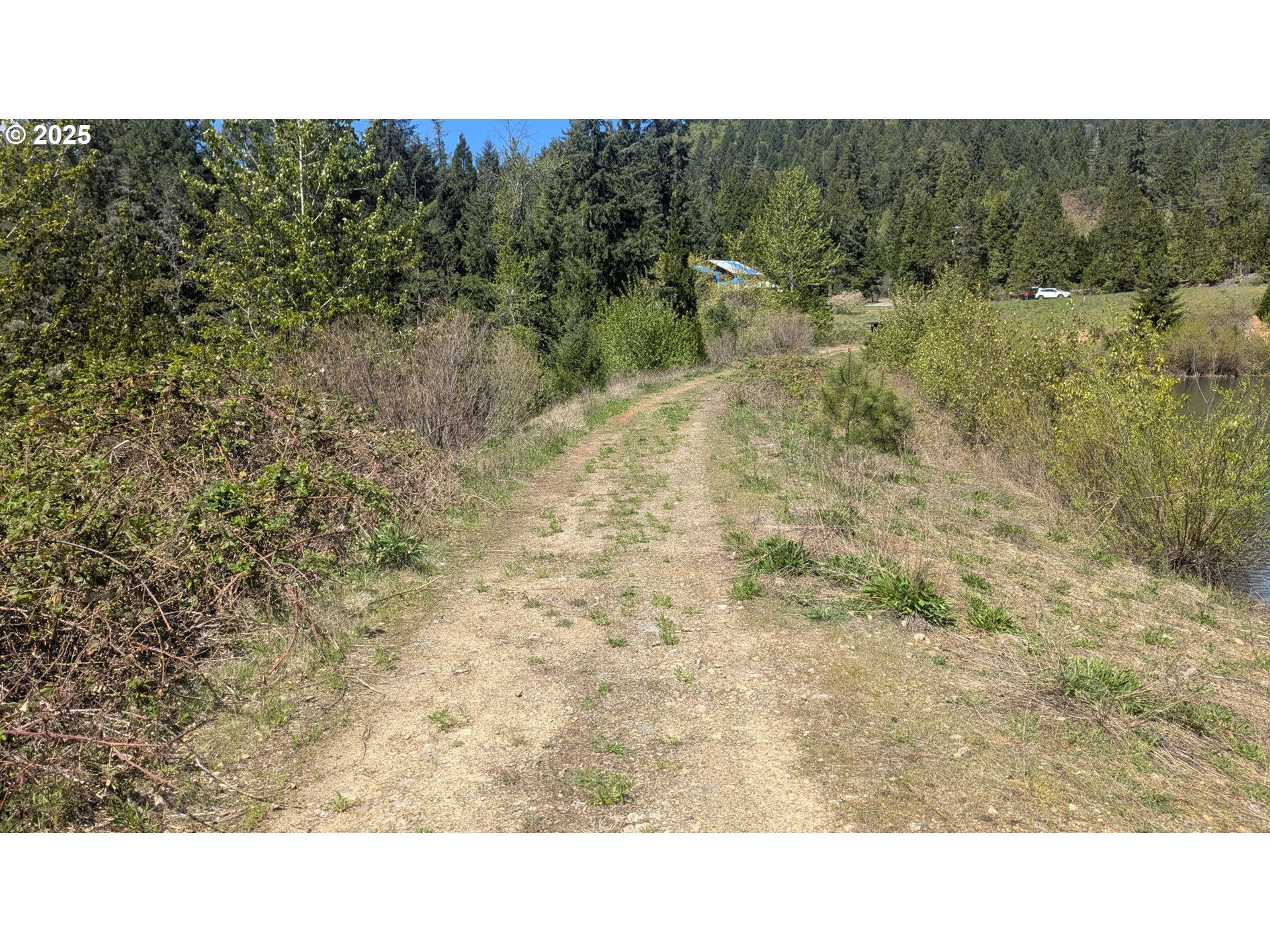 2999 Speaker Road Wolf Creek, OR 97497 - Photo 23 of 29 a open area of a house