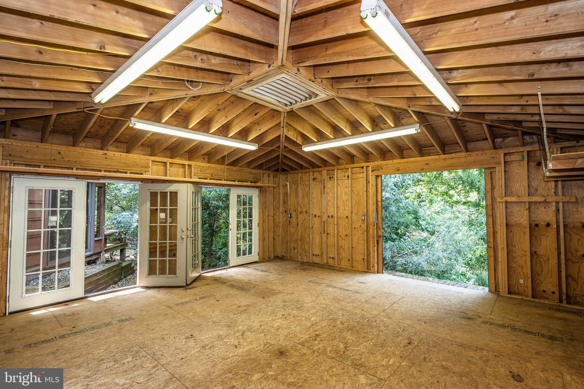 9528 Rockport Road Vienna, VA 22180 - Photo 46 of 49 Interior workshop with whole house fan