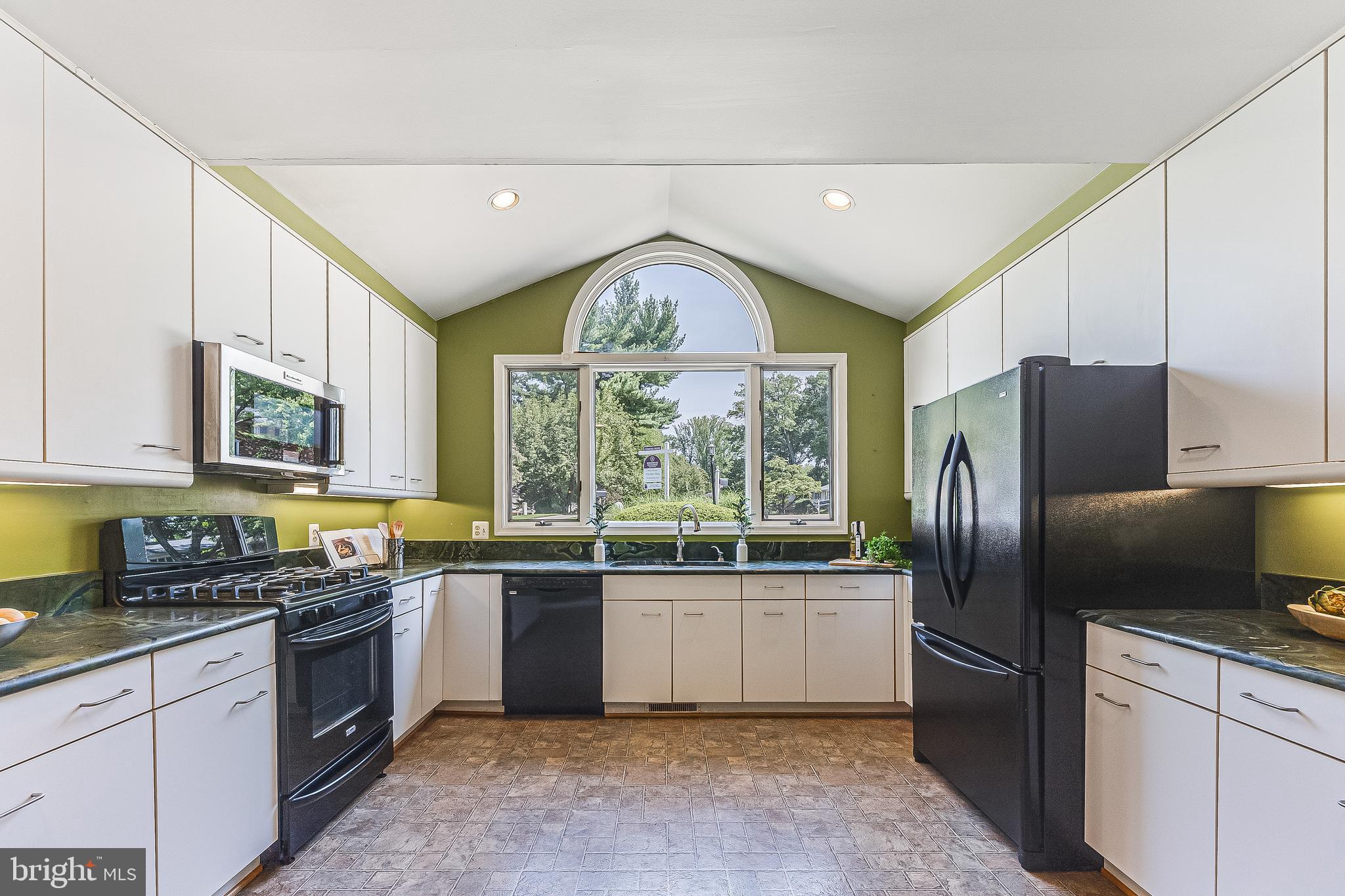 9528 Rockport Road Vienna, VA 22180 - Photo 6 of 49 Large palladium window drenches kitchen in light