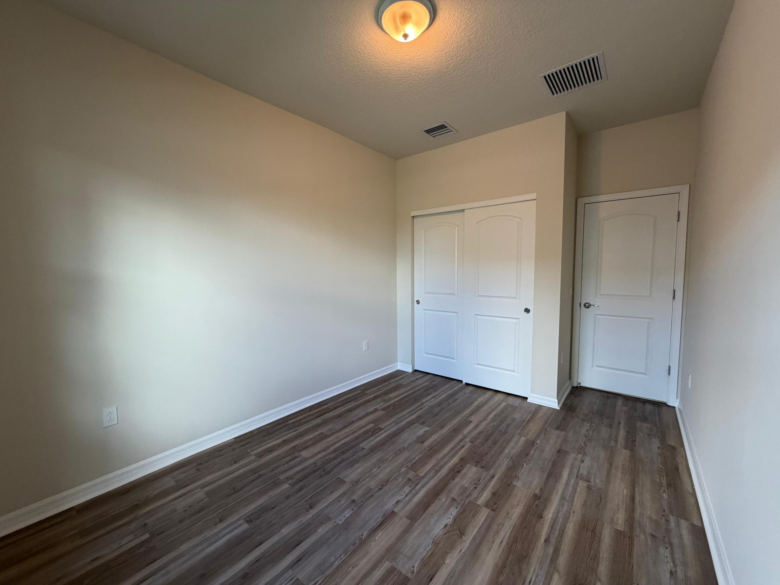 8246 Cadre Noir Road Lake Worth, FL 33467 - Photo 37 of 54 Bedroom 5