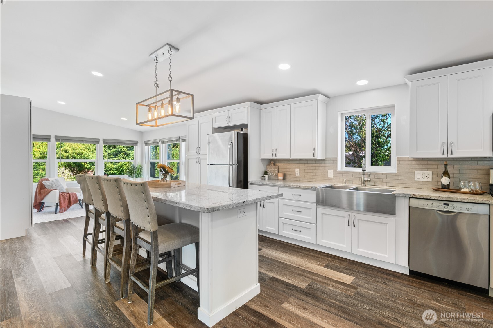 3471 Birch Bay Lynden Road Custer, WA 98240 - Photo 3 of 38 a kitchen with stainless steel appliances granite countertop a white table chairs and a window