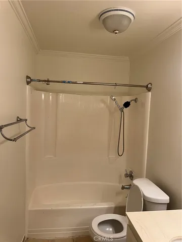 a bathroom with a sink a toilet and a bathtub