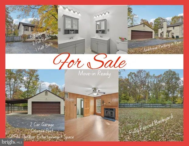 a view of a house with a yard covered in snow