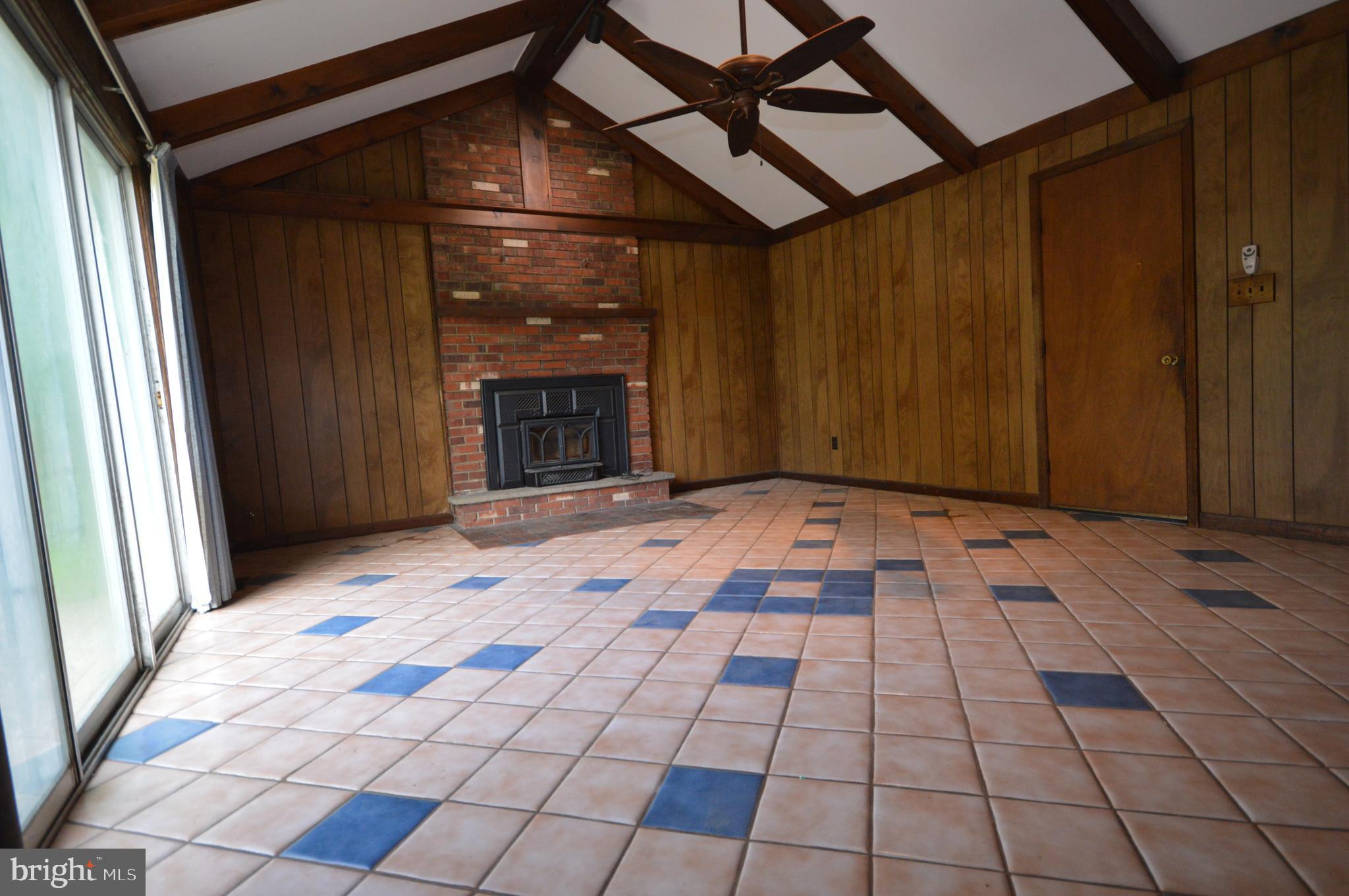749 Street Road Cochranville, PA 19330 - Photo 24 of 35 Family room with Fireplace