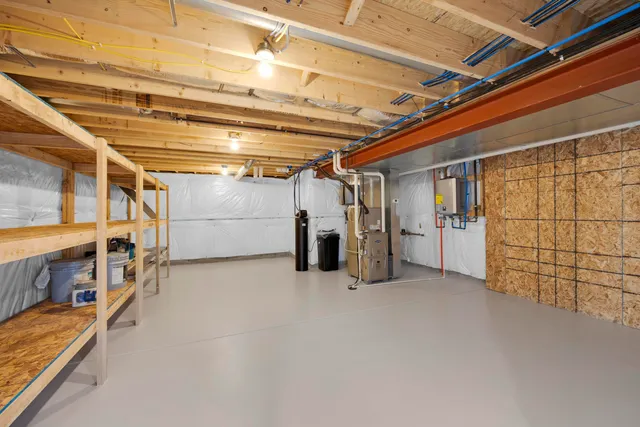 a bathroom with a shower sink vanity granite and shower